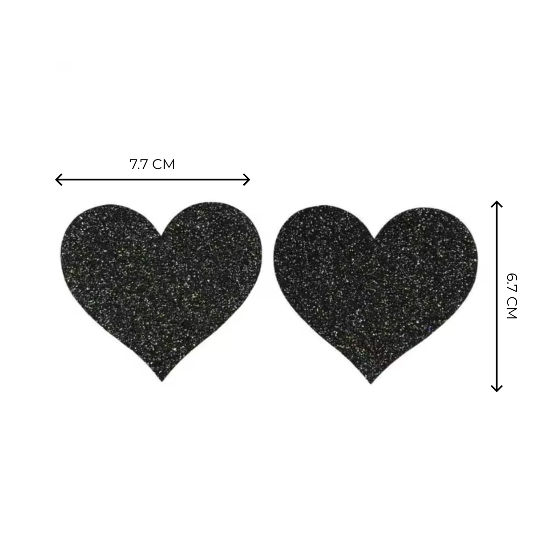 Midnight black glitter heart-shaped nipple covers, reusable and breathable for pole fitness and exotic dance routines.