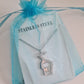Polished Stainless Steel Gemini Pole Dance Necklace with pendant depicting a pole dancer in an inverted pose