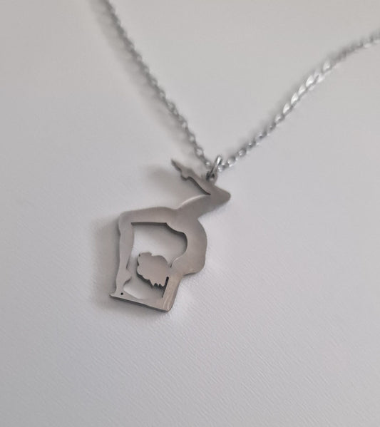Polished Stainless Steel Gemini Pole Dance Necklace with pendant depicting a pole dancer in an inverted pose
