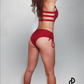 Glitter Red Cheeky Shorts - Full pole dance outfit back view highlighting the sparkling red glitter design and the overall look. Pole dance, pole, pole dance outfit, pole wear, pole shorts, pole junkie, pole clothing.