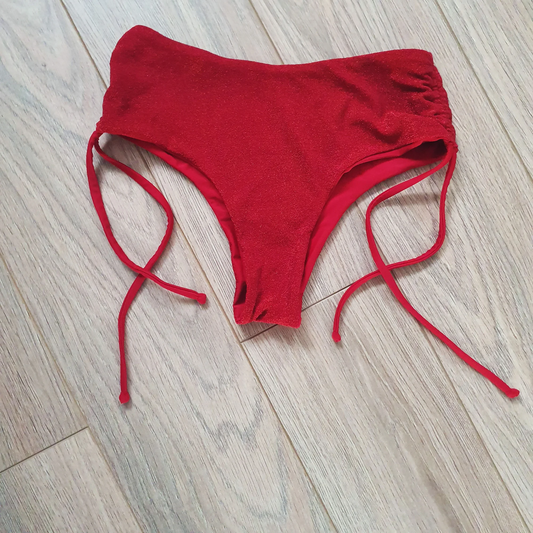 Glitter Red Cheeky Shorts - Front view showcasing the dazzling red glitter overlay and full coverage design of these pole dance shorts. Pole dance, pole, pole dance outfit, pole wear, pole shorts, pole junkie, pole clothing.