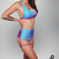 Front view of Tie Dye High-Waisted Scrunch Bum Garter Shorts, showcasing the vibrant tie-dye pattern and garter detail, designed for pole dance. Photo showing the complete tie dye pole dance outfit.