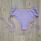 Back view of Luscious Lilac Glitter Cheeky Shorts. Highlights the full coverage design and glitter detail, designed for comfort and style in pole dancing.
