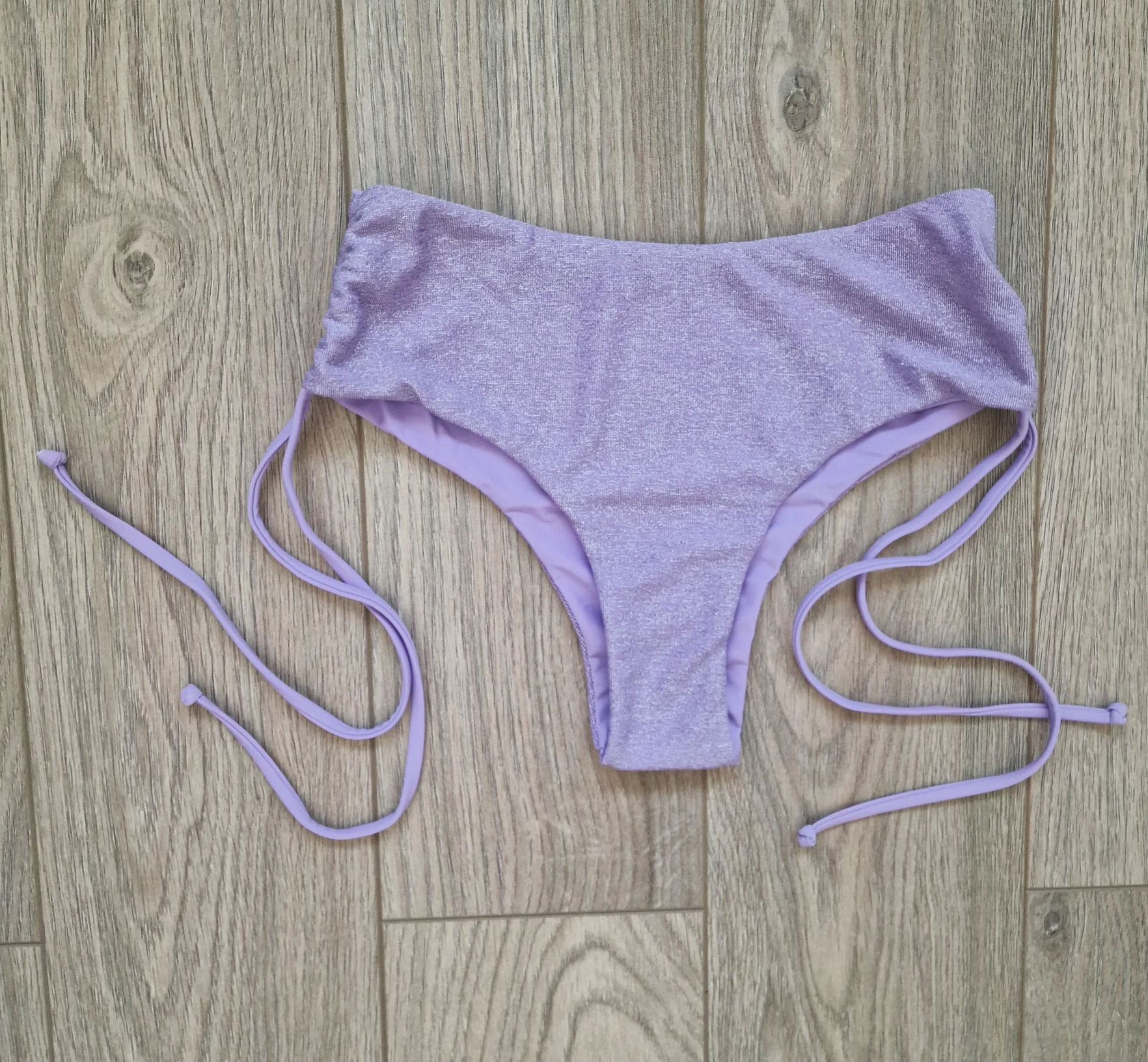 Back view of Luscious Lilac Glitter Cheeky Shorts. Highlights the full coverage design and glitter detail, designed for comfort and style in pole dancing.